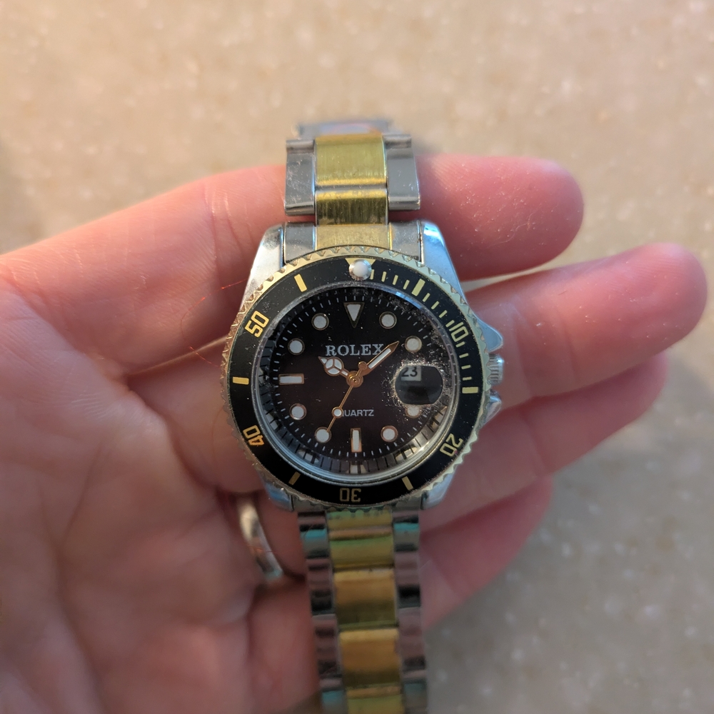 Silver and Gold Watch with Black Dial